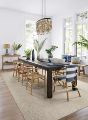 Dining room with FLOR Industrious area rug shown in Beige