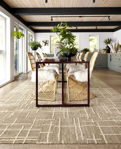 Dining room with FLOR area rug Draper shown in Topaz