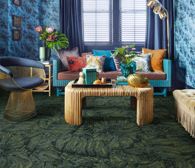 Living room FLOR Palm Reader area rug shown in Kale